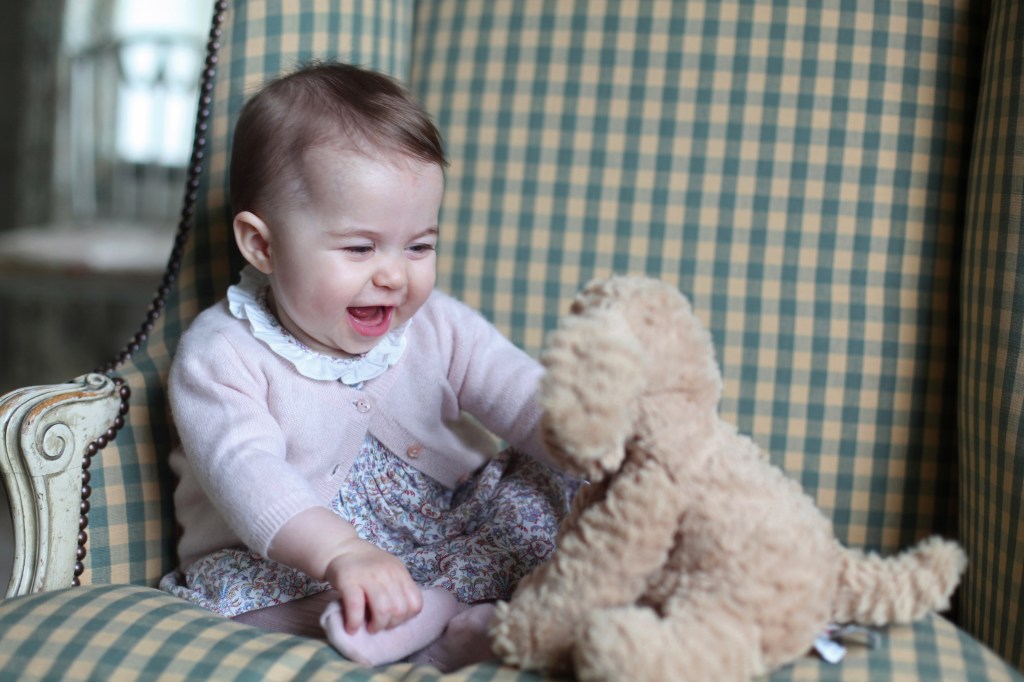ANMER HALL, ENGLAND - UNDATED: In this undated handout photo provided by HRH The Duchess of Cambridge, Princess Charlotte of Cambridge plays with a teddy as she is seen at Anmer Hall earlier this month taken by Catherine, Duchess of Cambridge in Sandringham, England. (Photo by HRH The Duchess of Cambridge via Getty Images) EDITORIAL USE ONLY. NO COMMERCIAL USE (including any use in merchandising, advertising or any other non-editorial use including, for example, calendars, books and supplements). This photograph is provided to you strictly on condition that you will make no charge for the supply, release or publication of it and that these conditions and restrictions will apply (and that you will pass these on) to any organisation to whom you supply it. All other requests for use should be directed to the Press Office at Kensington Palace in writing.