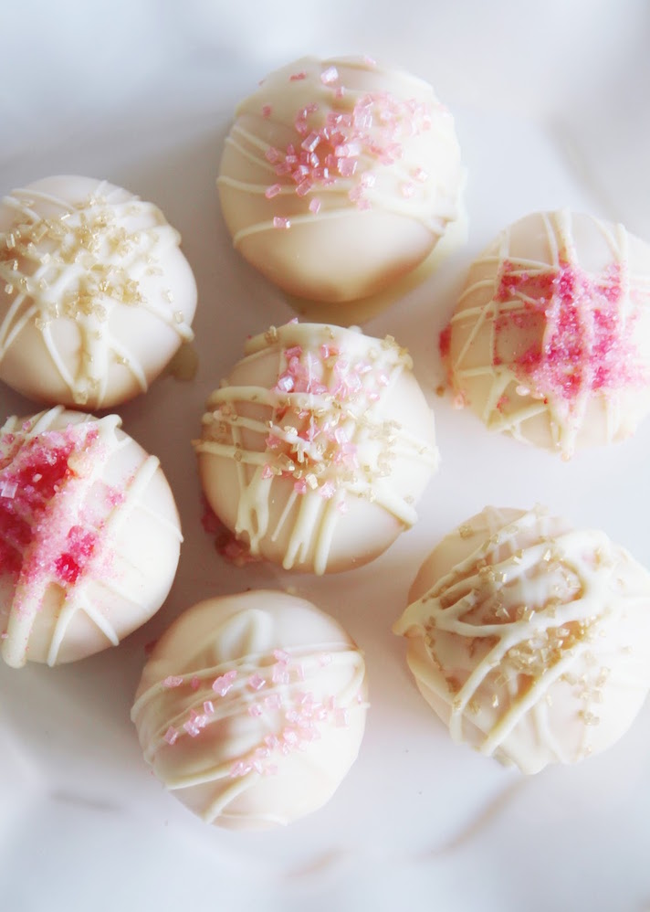 STYLECASTER | 25 Festive Recipes That Will Impress Your Friends on New Year’s Eve | Champagne Cake Pops