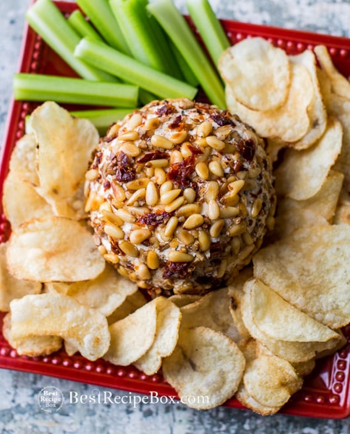STYLECASTER | 13 Cheese Balls That Will Steal the Show at Every Party | Sun-Dried Tomato Cheese Ball