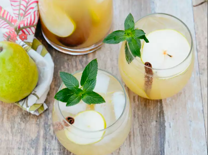 STYLECASTER | 17 Easy Ginger Cocktails for Anyone Who Loves Moscow Mules | Pear Ginger Pitcher Cocktail