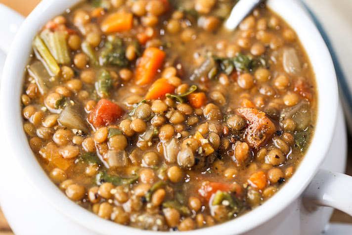 STYLECASTER | 17 Slow-Cooker Soups with Tons of Fresh Greens | Lentil Spinach Soup