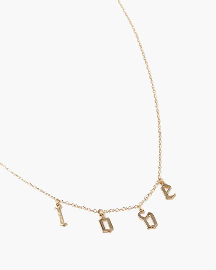 STYLECASTER | Word and Name Jewelry Is Having a Moment, Because Carrie Bradshaw Is a Forever Fashion Icon