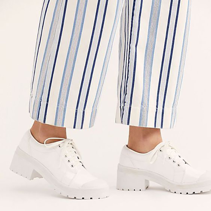 STYLECASTER | Dainty White Sneakers You Could Definitely Wear Under Your Bridal Gown