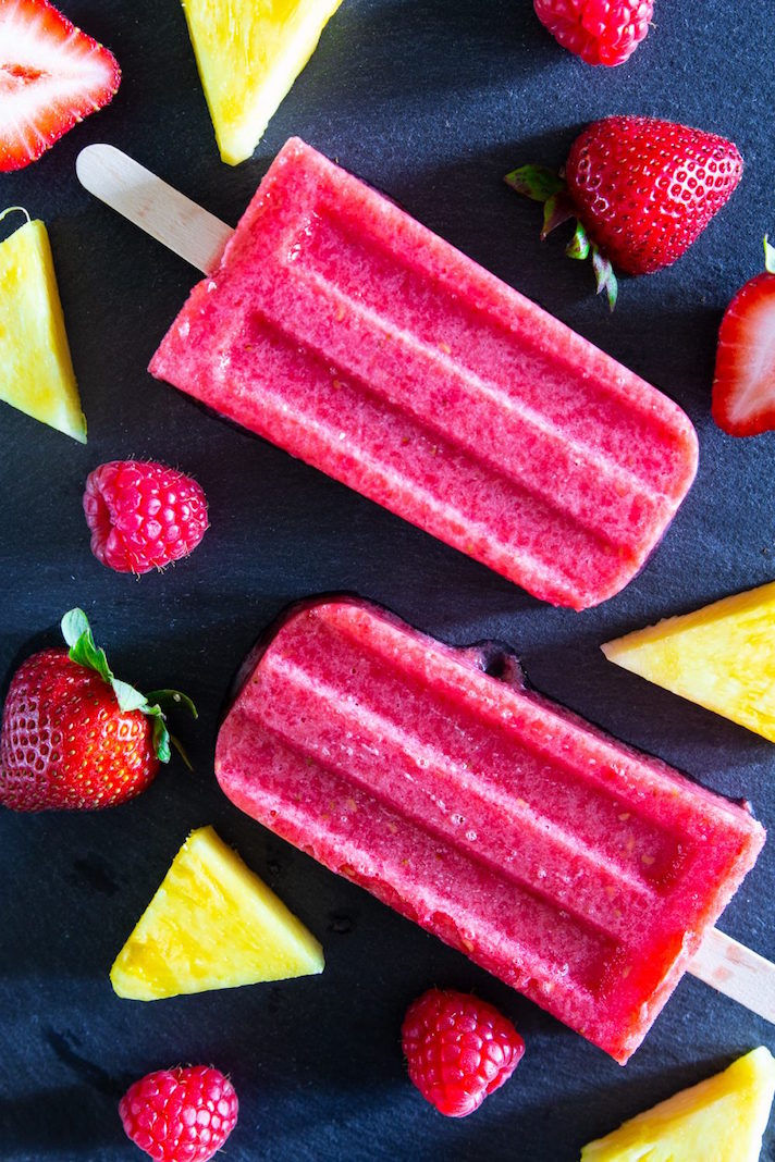 STYLECASTER | 17 DIY Popsicles To Make With All That Summer Fruit | Strawberry-Pineapple Popsicles