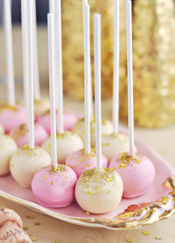STYLECASTER | Glitter-Filled Recipes for New Year's Eve | Pink Champagne Cake Pops