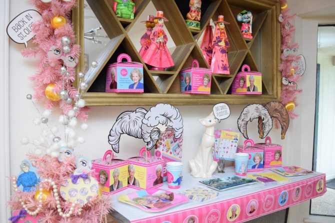 A table covered with Golden Girls-themed decor