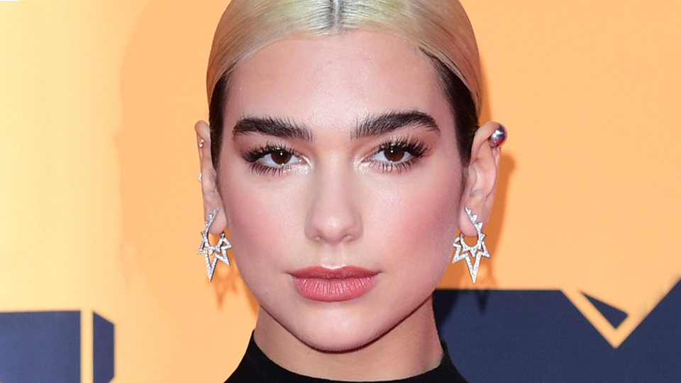STYLECASTER | Dua Lipa Fishnets Rolling Stone