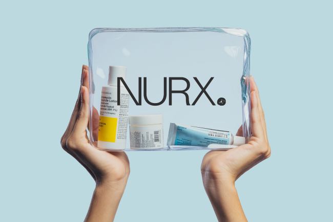 A woman holding up a clear Nurx bag that has three Nurx skincare products inside of it