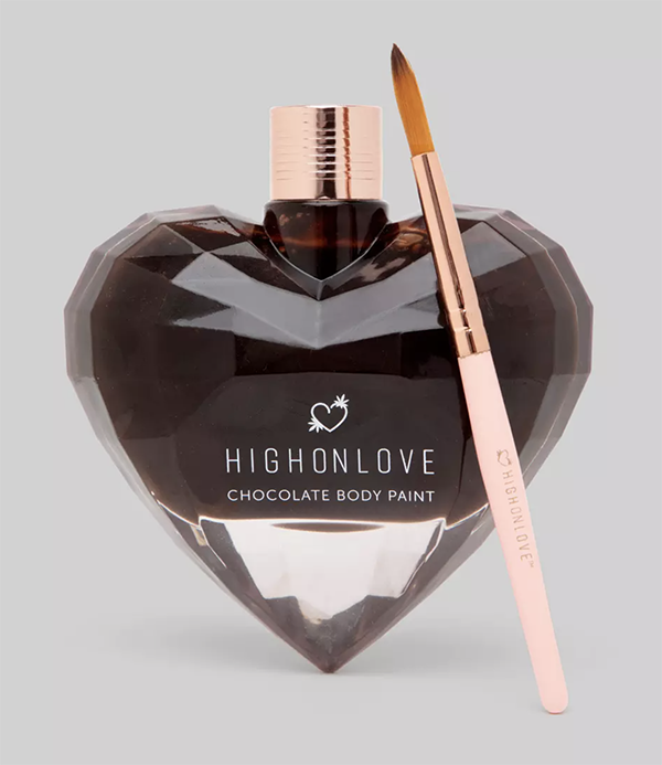 A heart-shaped bottle of chocolate body paint