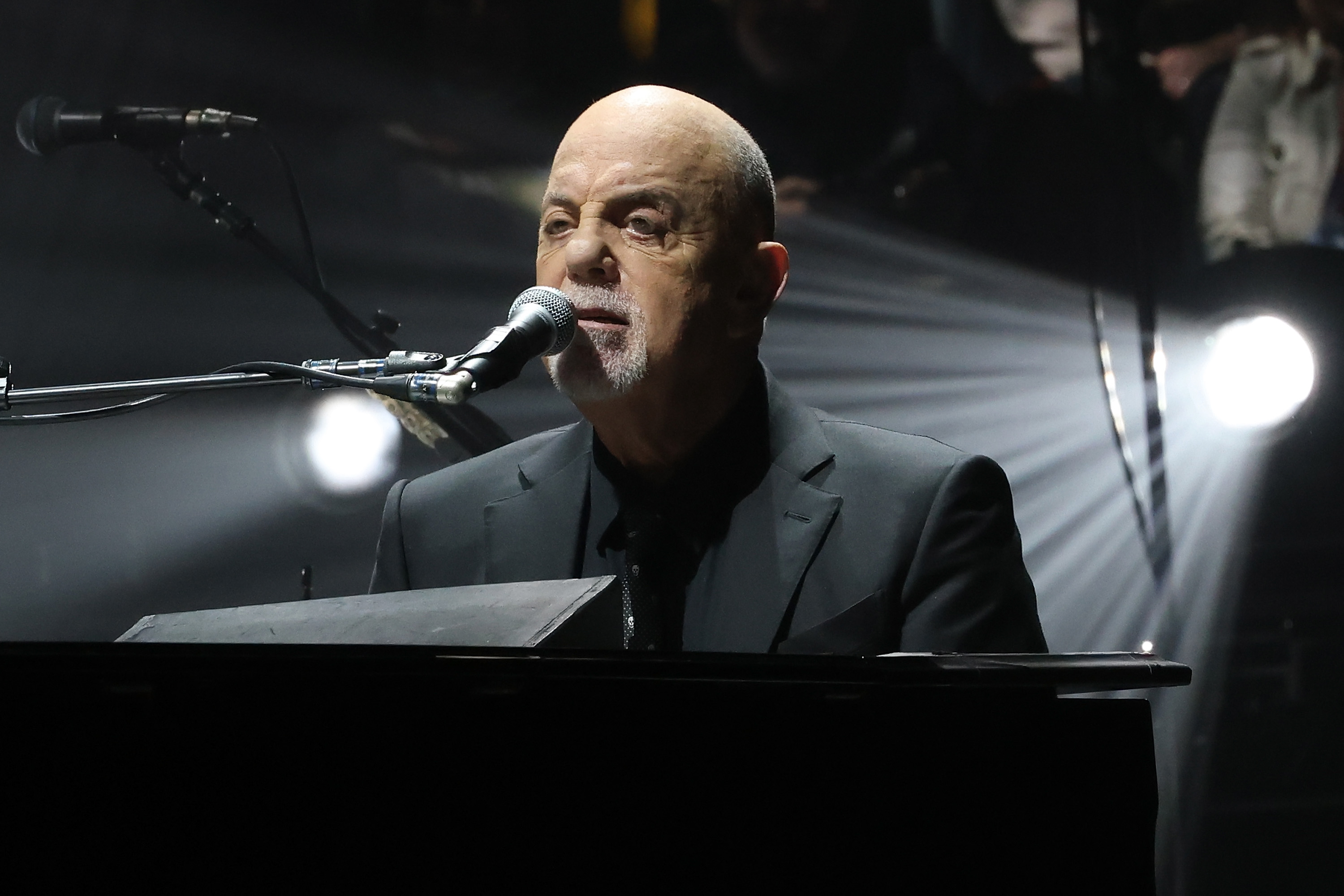 Billy Joel plays piano at Madison Square Garden.