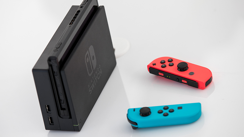 Nintendo Switch console, black, blue, and red