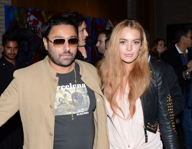 Vikram Chatwal and Lindsay Lohan attend the Domingo Zapata "Life Is A Dream" Art Exhibition at Dream Downtown on May 10, 2012 in New York City.