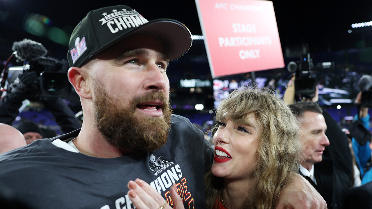 Taylor Swift & Travis Kelce Are Vacationing in the Same Place She Went to With Ex-Joe Alwyn. Photo of Travis Kelce and Taylor Swift at the NCF championships