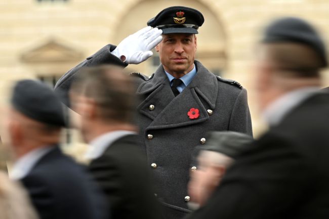 Britain's Prince William, Duke of Cambridge salutes veterans marching past on Horse Guards Parade during the Remembrance Sunday ceremony in Whitehall on November 14, 2021 in London, England. Remembrance Sunday is an annual commemoration held on the closest Sunday to Armistice Day, November 11, the anniversary of the end of the First World War and services across Commonwealth countries remember servicemen and women who have fallen in the line of duty since WWI.