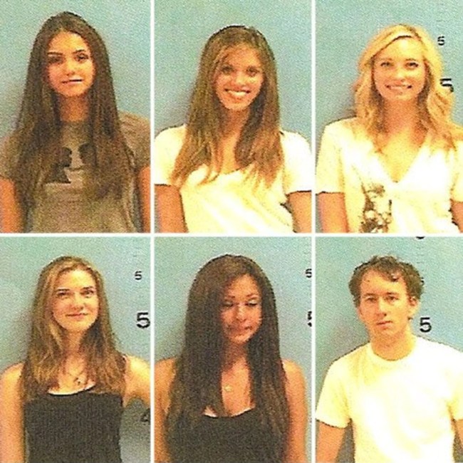 The cast poses for their mugshots in green background.