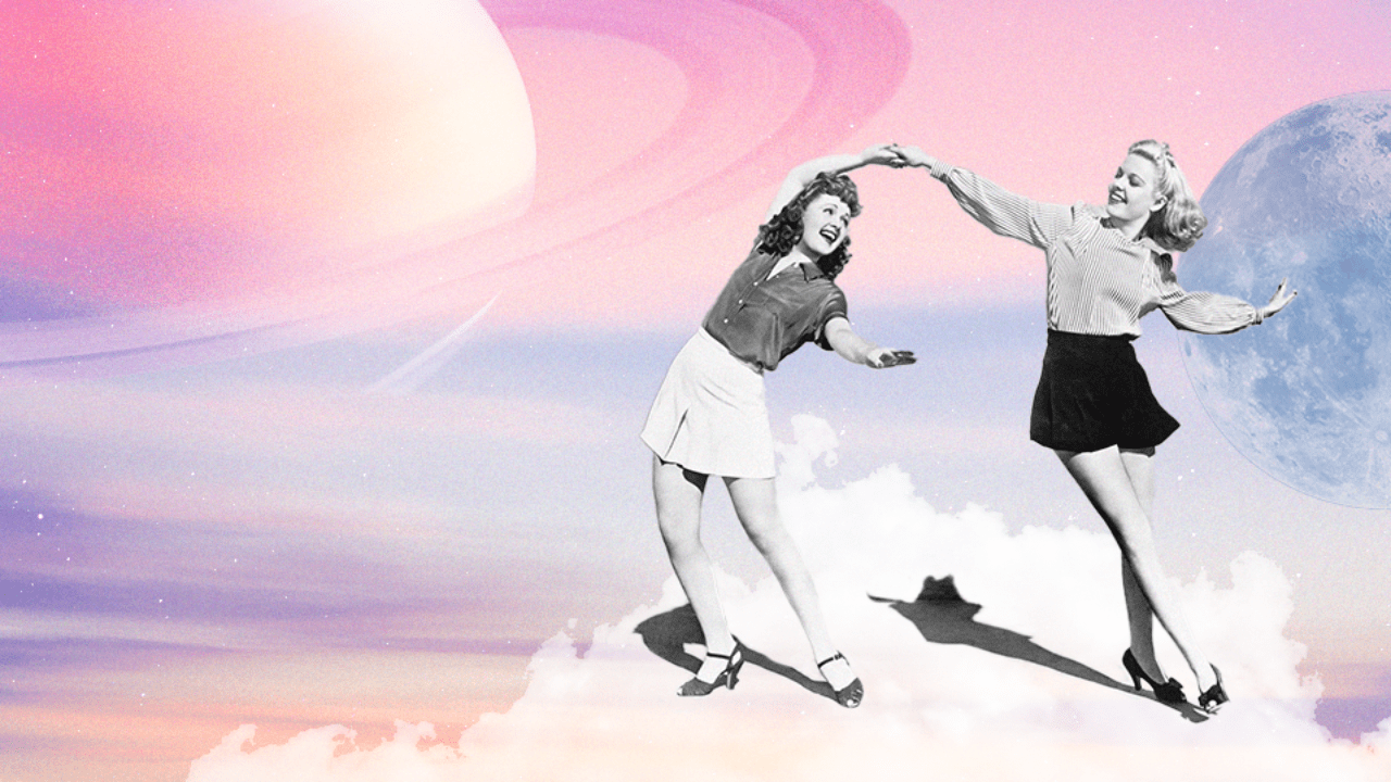 A couple of women dancing in front of a pink sky with planet Saturn hanging over them