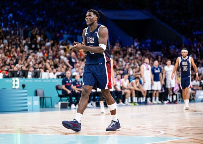 Anthony Edwards of USA applauds fans  while the group stage match between Serbia and USA on day two of the Olympic Games Paris 2024 at Stade Pierre Mauroy on July 28, 2024 in Lille, France. (Photo by Markus Gilliar - GES