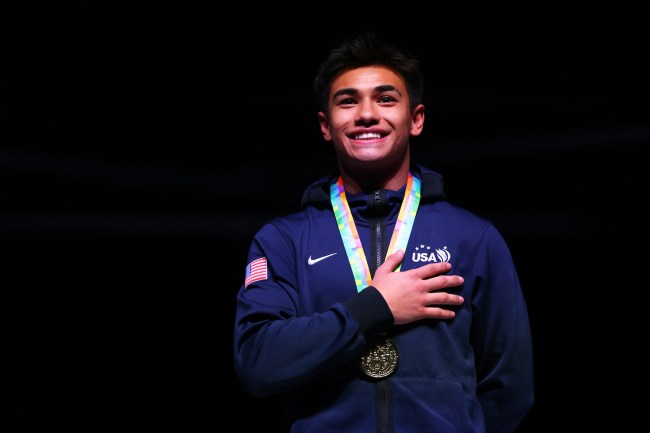 Ruben Padilla of USA celebrates on the podium after winning the gold medal in the DMT on day three of the 37th FIG Trampoline Gymnastics World Championships at Utilita Arena on November 11, 2023 in Birmingham, England.