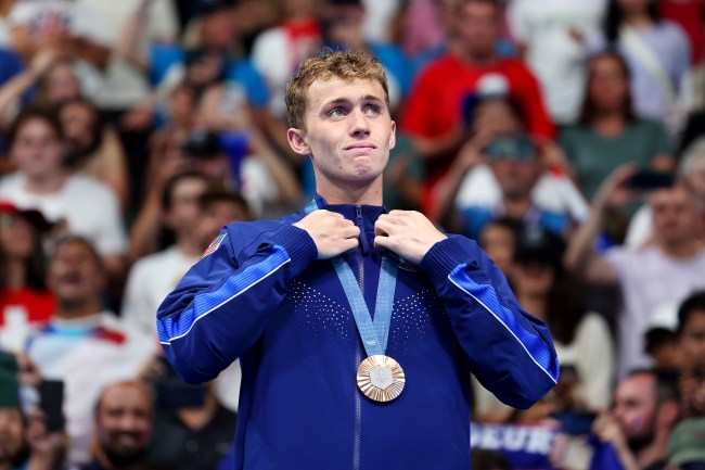Bronze Medalist Carson Foster of Team United States stands on the podium during the Swimming medal ceremony after the Men’s 400m Individual Medley Final on day two of the Olympic Games Paris 2024 at Paris La Defense Arena on July 28, 2024 in Nanterre, France