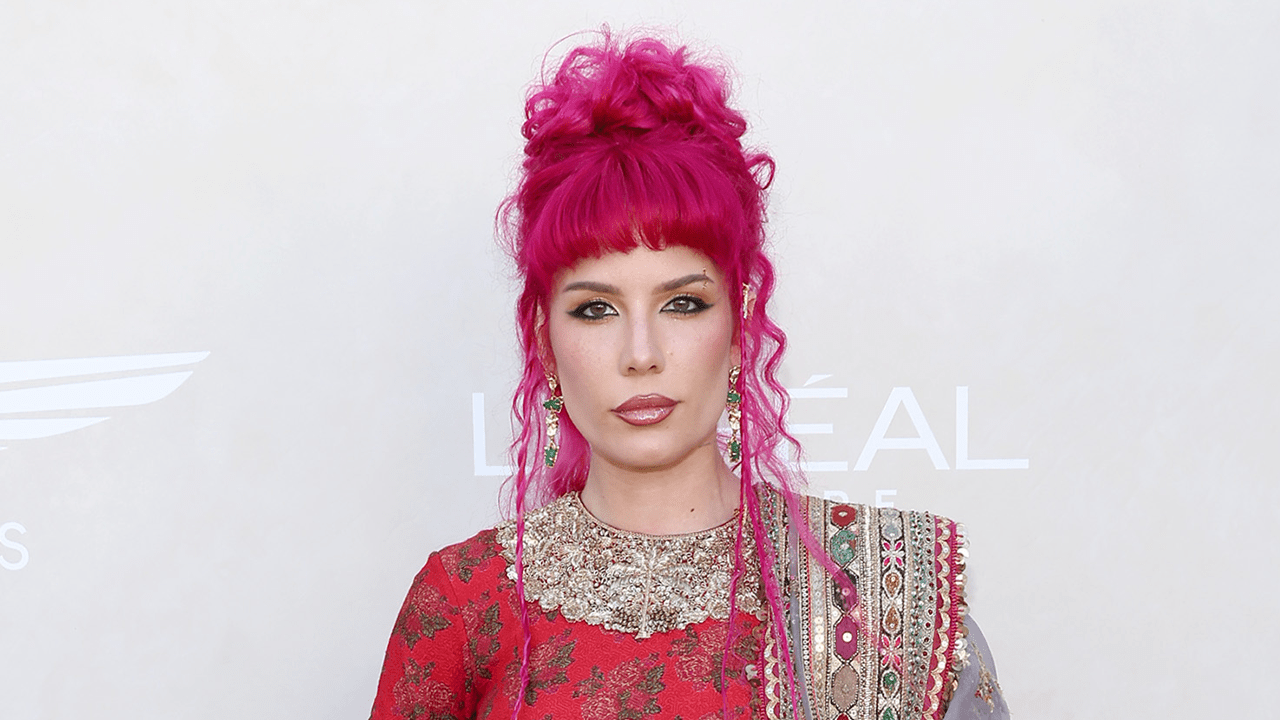 Halsey with hot pink hair.
