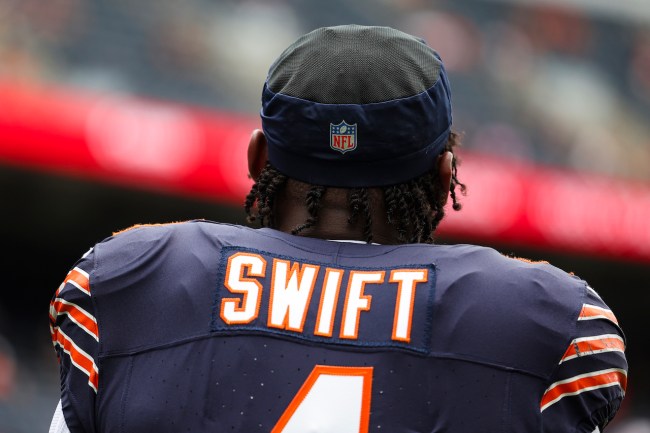 D'Andre Swift #4 of the Chicago Bears looks on prior to an NFL football game against the Cincinnati Bengals at Solider Field on August 17, 2024 in Chicago, Illinois.