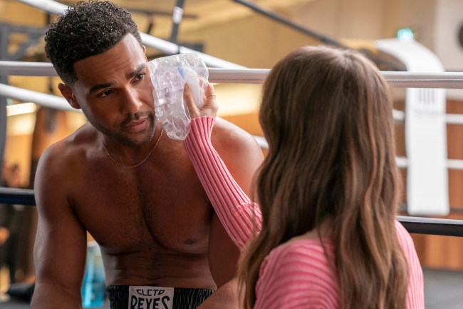 Lucien Laviscount as Alfie, Lily Collins as Emily in episode 401 of Emily in Paris.