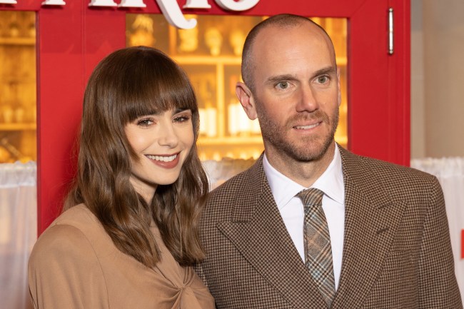 Lily Collins and Charlie McDowell attend the "Emily In Paris" season 3 world premiere at Theatre Des Champs Elysees on December 06, 2022 in Paris, France.