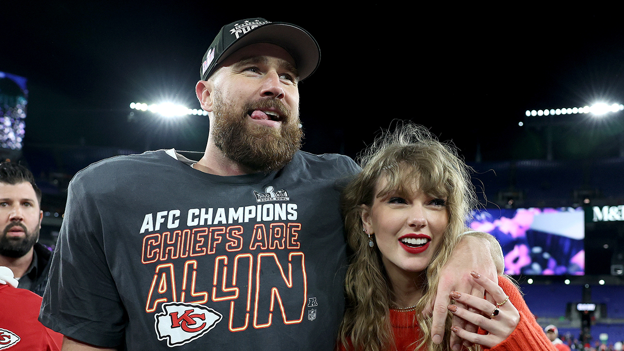 BALTIMORE, MARYLAND - JANUARY 28: Travis Kelce #87 of the Kansas City Chiefs celebrates with Taylor Swift after a 17-10 victory against the Baltimore Ravens in the AFC Championship Game at M&T Bank Stadium on January 28, 2024 in Baltimore, Maryland.