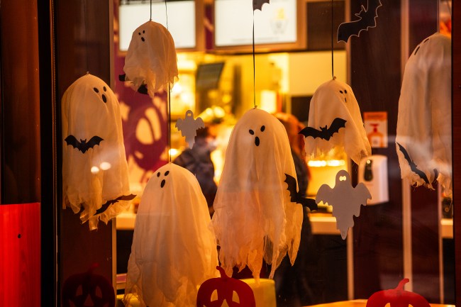 Bright, spooky city store decorated for Halloween