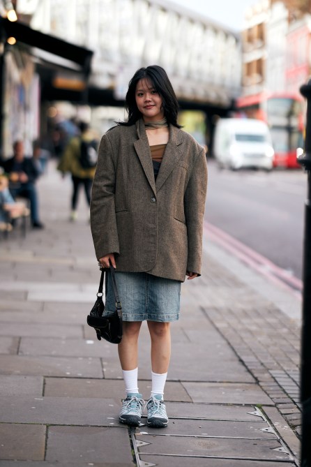A fashion week guest wearing an oversized blazer.