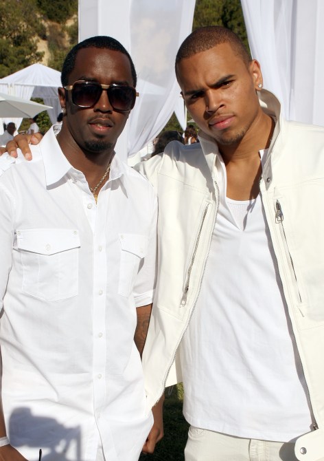 Sean "Diddy" Combs and singer Chris Brown attend the White Party hosted by Sean "Diddy" Combs and Ashton Kutcher to help raise awareness for Malaria No More held at a Private Residence on July 4, 2009 in Beverly Hills, California.