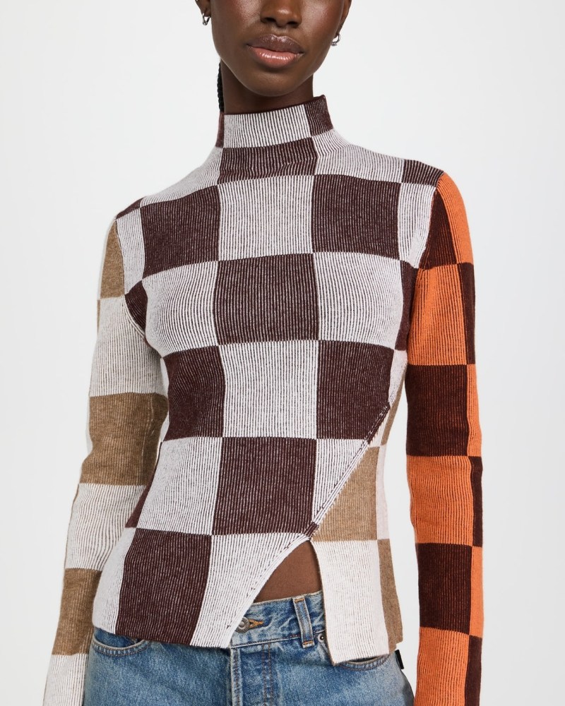 Men's Sweater Trends: Sweater Vests, Graphics, & More