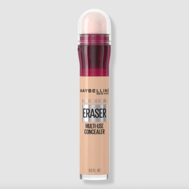 Maybelline Instant Age Rewind Concealer in a clear tube with an applicator.