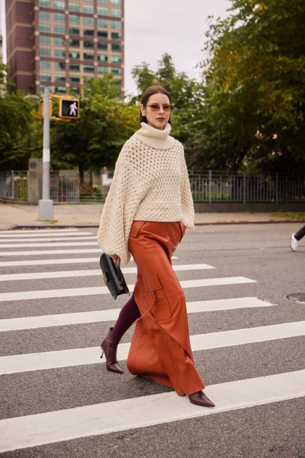 woman wearing an orange leather skirt in New York City
