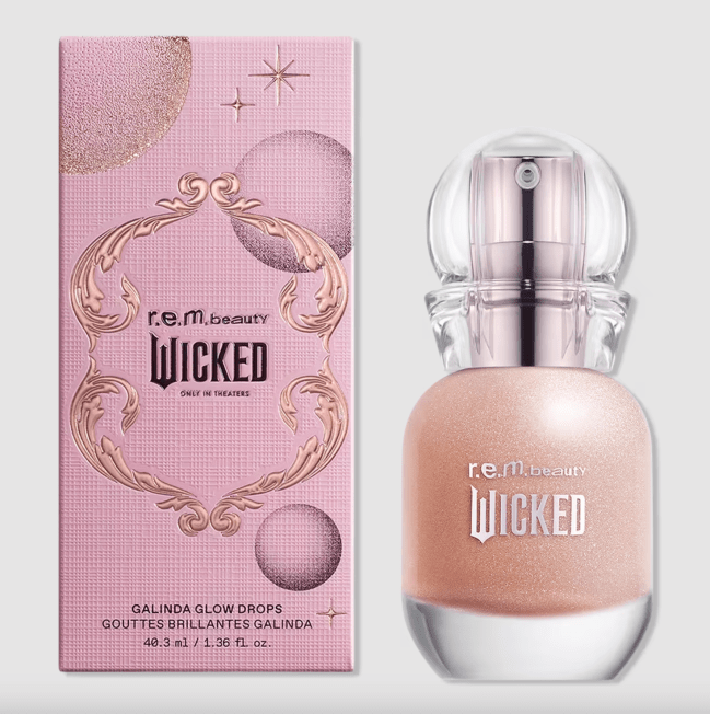 R.e.m. Beauty x Wicked Galinda Glow Drops next to a pink box.
