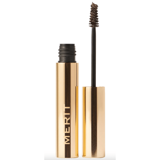 Merit Brow 1980 Volumizing Tinted Eyebrow Gel-Pomade in a gold tube.