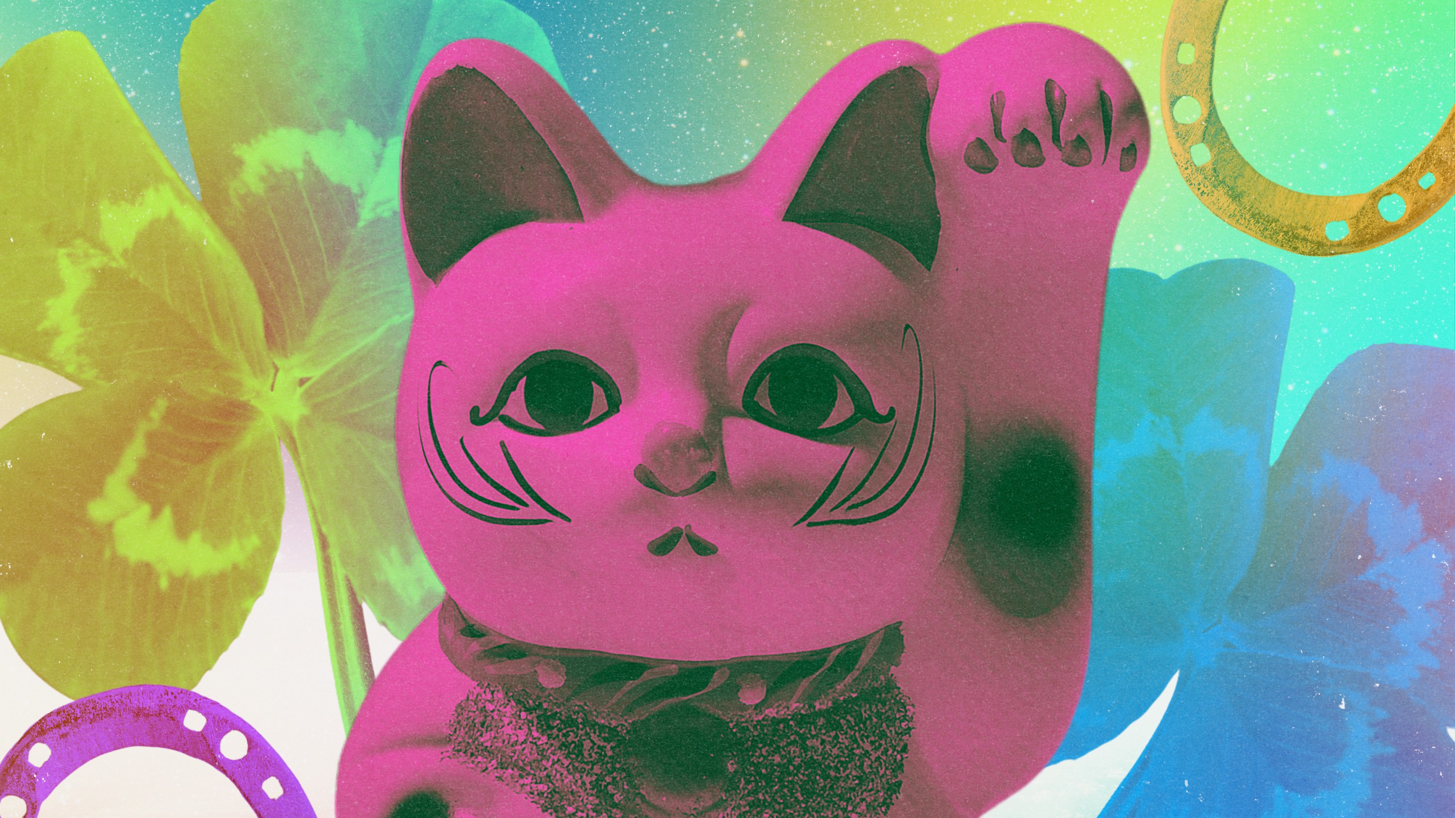 Maneki neko, a four-leaf clover, and other symbols of luck.
