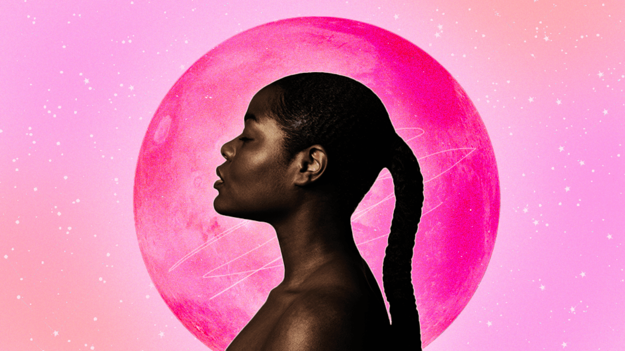 A woman's profile against a pink planet over a pink cosmic sky