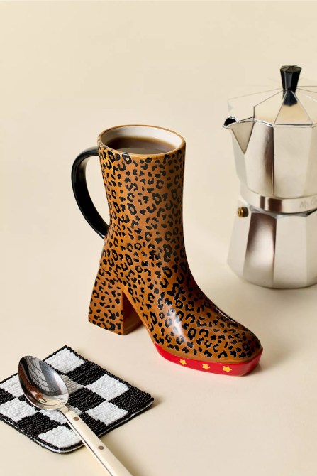 A mug shaped like a platform cheetah boot