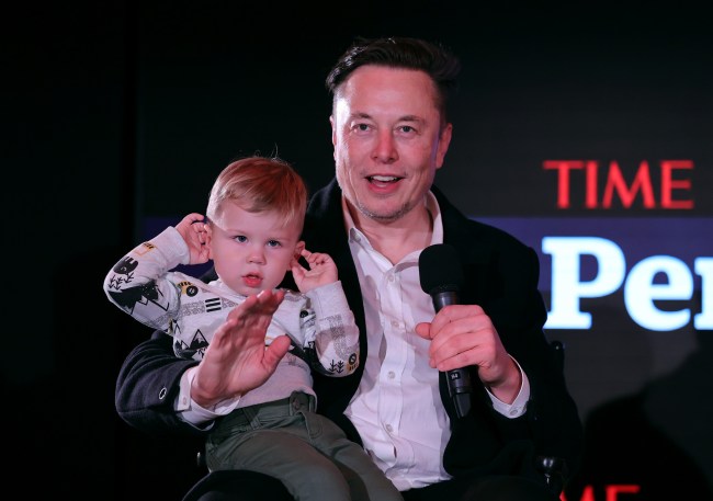 NEW YORK, NEW YORK - DECEMBER 13: Elon Musk and son X Æ A-12 on stage TIME Person of the Year on December 13, 2021 in New York City.