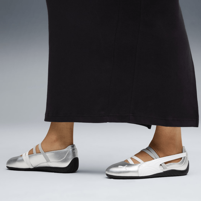 A model wearing the Puma Speedcat Ballet Metallic in silver