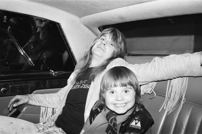Lead singer Ozzy Osbourne, of Black Sabbath, pictured in a car with son Louis Osbourne. 3rd August 1981.