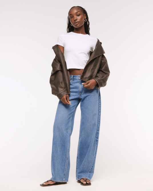 A model wearing Abercrombie & Fitch's Low Rise Ultra Loose Jean in a medium wash