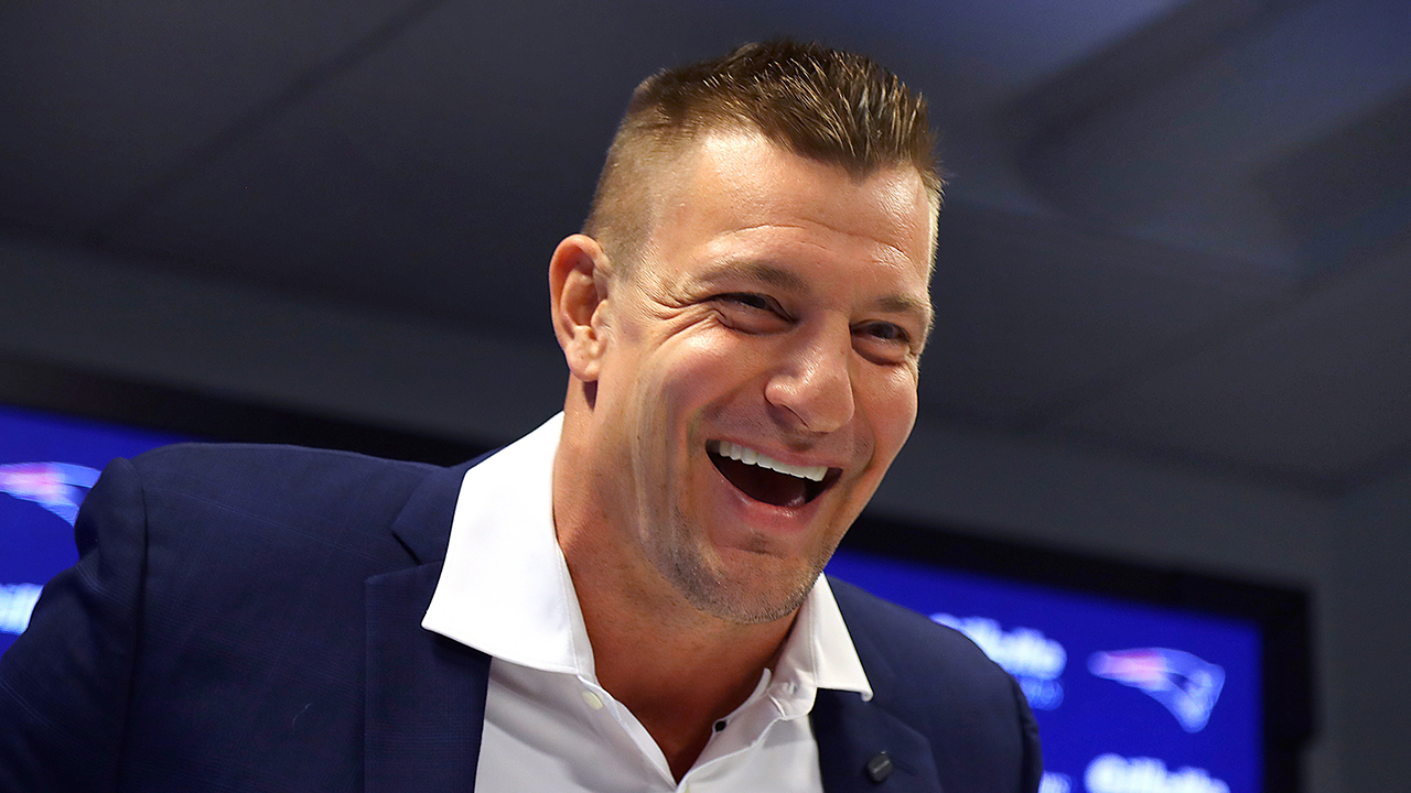 Foxborough, MA - November 12: Former New England Patriots tight end Rob Gronkowski laughs during a retirement ceremony on November 12, 2025. He signed a one-day contract with the team.