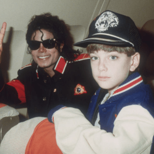 UNSPECIFIED - JULY 11: Michael Jackson with 10 year old Jimmy Safechuck on the tour plane on 11th of July 1988. (Photo by Dave Hogan/Getty Images)