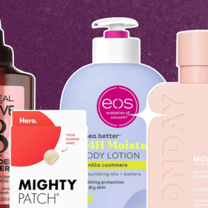 A purple background with four drugstore beauty products, including Monday shampoo, eos lotion, Mighty Patch acne patches, and L'Oréal hair gloss.