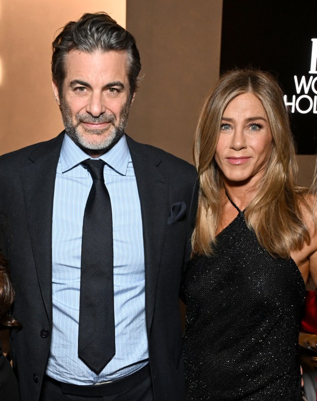 Jim Curtis and Jennifer Aniston, wearing Ralph Lauren, attend ELLE's 2025 Women in Hollywood Celebration presented by Ralph Lauren and Bvlgari with support from evian, Hendrick's Gin, and Lucid Motors on Nov. 17, 2025 in Los Angeles.